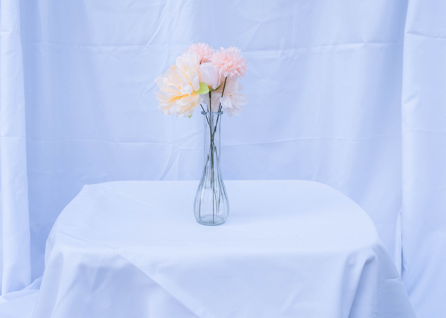 Mix of Light Pink and Peach Flowers in Medium Tall Vases